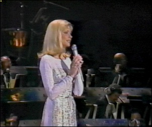 Olivia performs Hopelessly Devoted To You