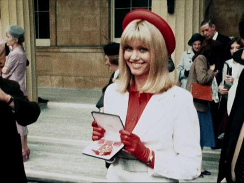 Olivia Newton-John receiving her OBE TV footage