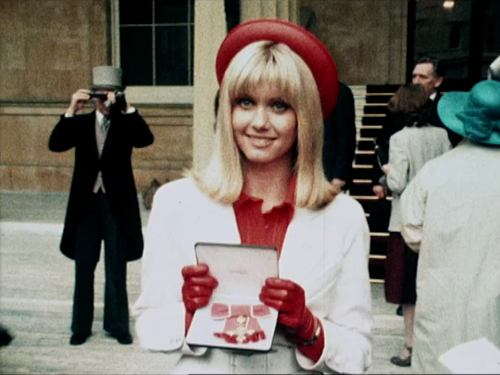 Olivia Newton-John receiving her OBE TV footage