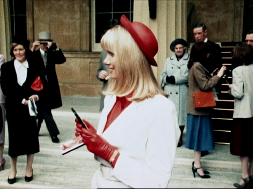 Olivia Newton-John receiving her OBE TV footage