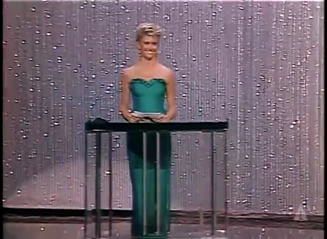 Olivia Newton-John presenting Oscar 1983