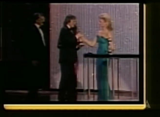 Olivia Newton-John presenting Oscar 1983